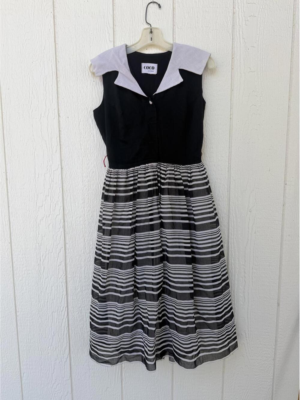 Vintage Black and White Sleeveless Dress with Striped Skirt